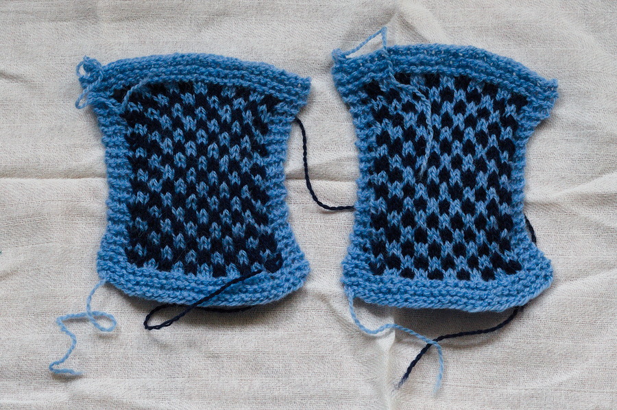 Two unblocked colourwork swatches